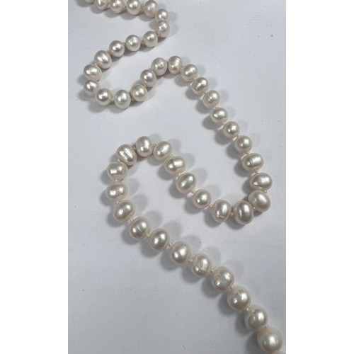 644 - A single strand necklace of 110 pearls, approx, average diameter 7mm, with natural blemishes, length... 