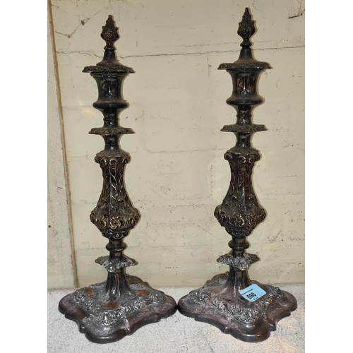 690 - A pair of silver on copper rococo style candle sticks with lids, height 39cm; a pair of silver plate... 