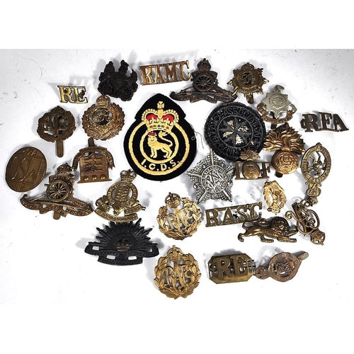 308 - A selection of various military badges and buttons etc