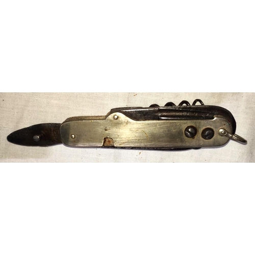 375B - A Boer War period Cavalry / coachmans pocket knife with detachable saddle studs, blades. corkscrew, ... 