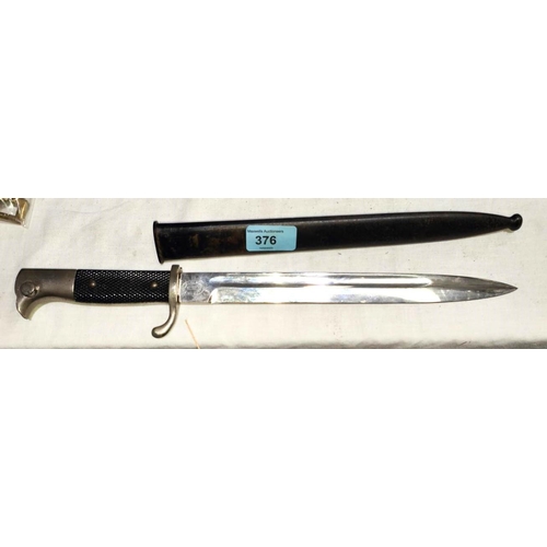 376 - A WWII German 3rd Reich parade bayonet with composition handle, stamped to the blade F.W.H.O.L.L.E.R... 