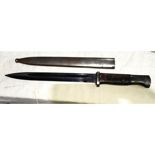 376A - A German WWII K98 bayonet with wooden handle,, metal fittings, with good amount of blueing to blade,... 