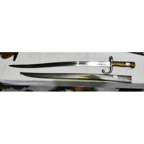 378A - A French model 1866 Chassepot sword bayonet with ribbed brass handle and scabbard numbered F21971, b... 