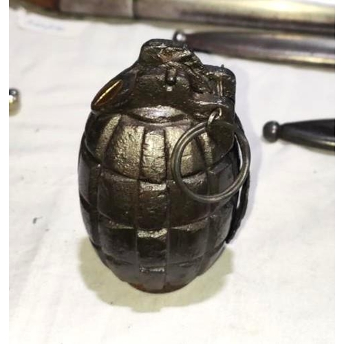 380 - An Inert WWII No 23 MK I Mills Bomb hand grenade, with base plug, height 10cm