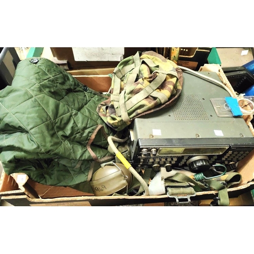 388B - An Icom receiver and a selection of military style jackets camouflage etc 