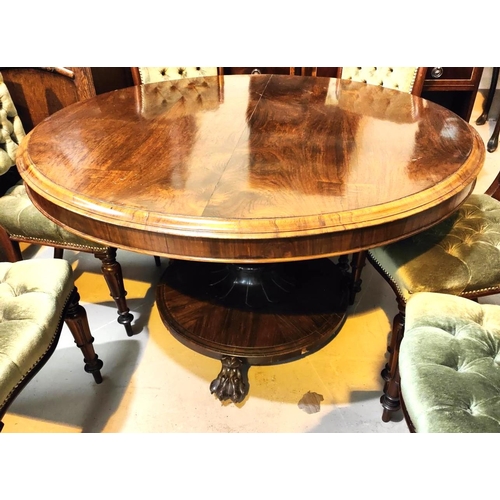 909A - A circular early/mid 19th century rosewood tilt-top supper table on octagonal baluster column, circu... 