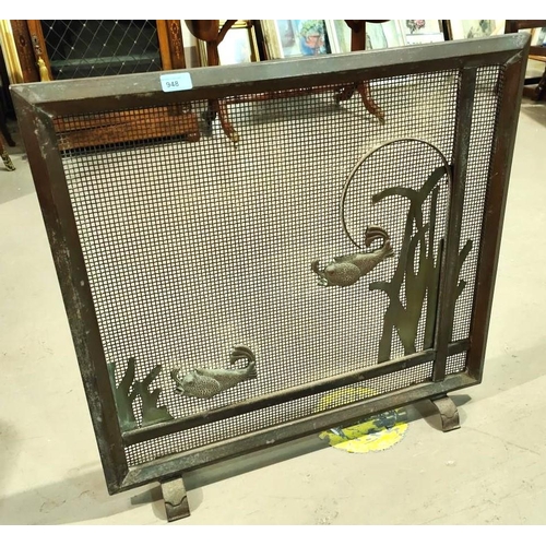 948 - A Japanese style copper fire screen decorated with Koi carp in relief 74x75cm