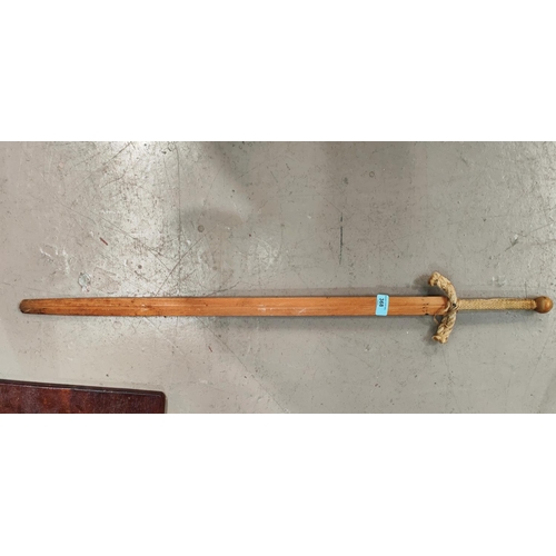 368 - An early 20th century Chinese/Japanese wooden practice sword with straight blade, rope hilt and hess... 