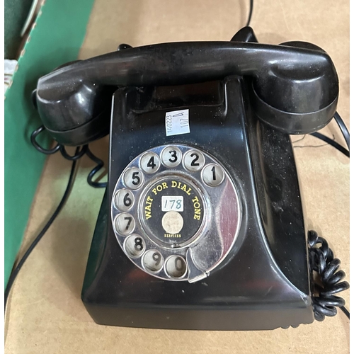 107A - An early 20th century Rotary dial black Bakelite telephone 