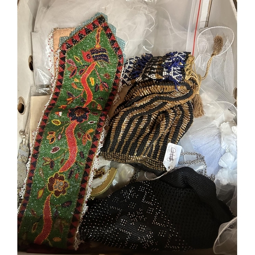 109 - A selection of beaded bags, a beaded Indonesian wedding banner and lace ware etc