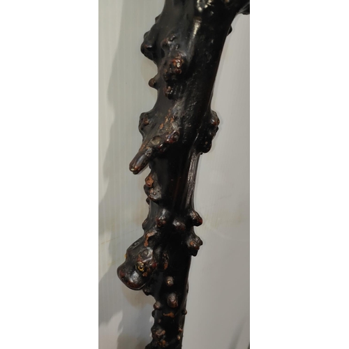 138 - An IRISH SHILLELAGH of magnificent proportions, blackthorn carved with a man's face to the finial an... 