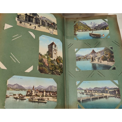 176 - A collection of Raphael Tuck Oilette postcards in album and an album of similar continental cards