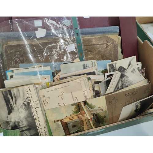 177 - A good selection of vintage postcards in album and loose