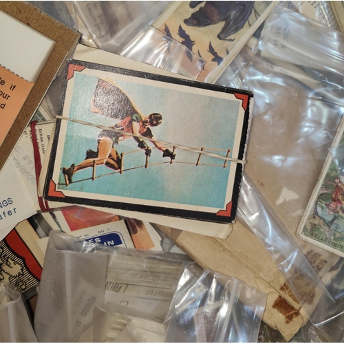 179 - A selection of vintage cigarette cards, sets, part sets and singles including some earlier sports ca... 