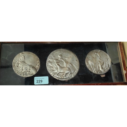 229 - PISANO MEDALS - 3 19th century electrotype casts of early Pisano medals, in display case 37 x 14.5cm