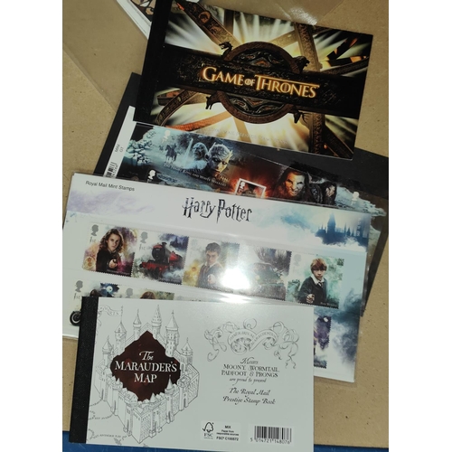 280 - HARRY POTTER: 30+ 1st class stamps (sets and book);Game of Thrones 20+ 1st class stamps (set and boo... 