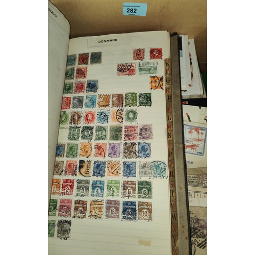 282 - A PRE-WAR album of world stamps, a collection of postal covers etc