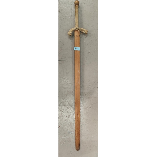 368 - An early 20th century Chinese/Japanese wooden practice sword with straight blade, rope hilt and hess... 