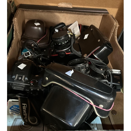 69 - A selection of cameras:  Minolta; 2 x Praktica; Fuji digital; 4 compact cameras; a camera box; ... 