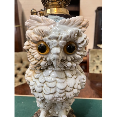 490 - OWL NURSERY LAMP, Continental porcelain with glass eyes, with brass fittings and shade, 33 cm (owl)