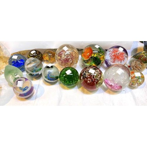 538 - A collection of 24 modern glass paperweights