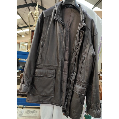 140 - A gent's dark brown leather coat size L/XL