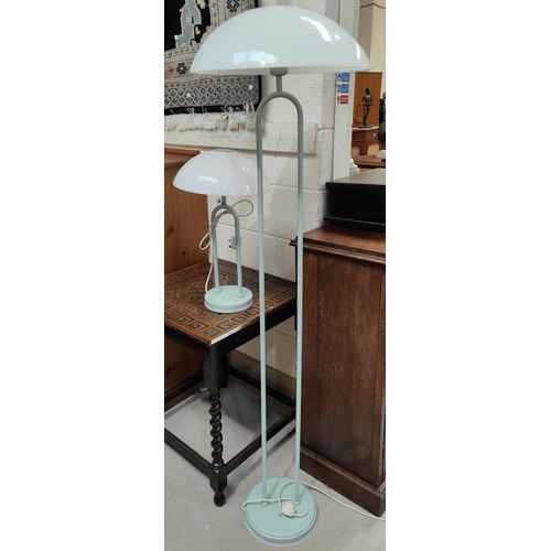 144 - A green painted twin column standard lamp with white perspex mushroom shade 165cm and a matching tab... 