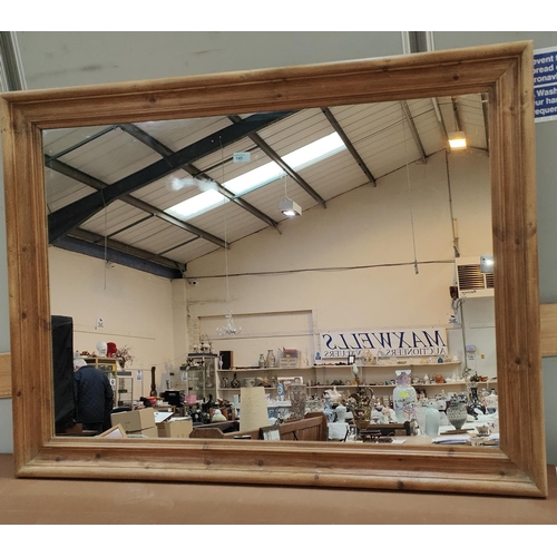 145 - A large rectangular wall mirror in pine frame, length 124cm; A Victorian style kitchen stool