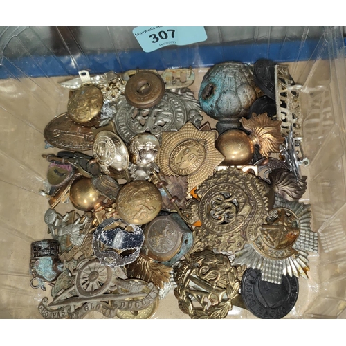 307 - A selection of military badges buttons etc