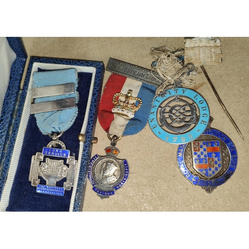 319 - Four hall marked silver and enamel Masonic and other jewels