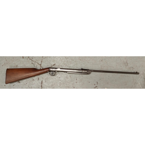 382A - A 'Tell' air rifle with steel body and wooden stock, with No 1024, length 102cm