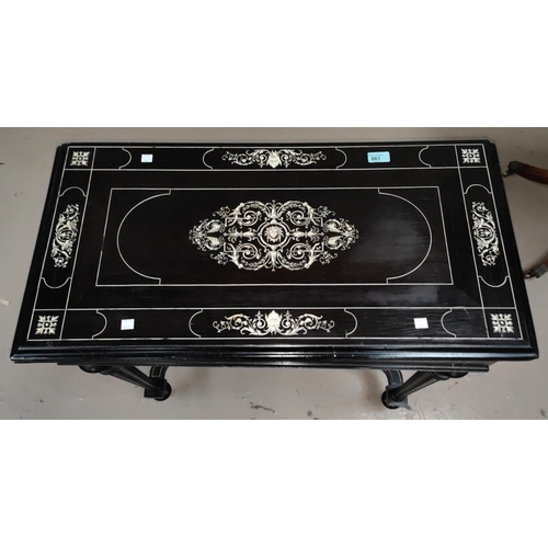 861 - A 19th century ebonised wood fold over card table with extensive scrolled and floral bone inlay baiz... 