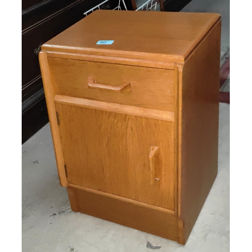 905 - A small mid 20th century light wood G-plan bedside cabinet