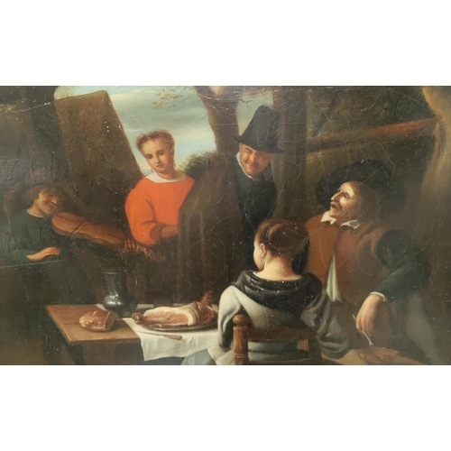 767 - Follower of Jan Steen; 19th Century Dutch School figures dining outside a tavern, musician in the ba... 