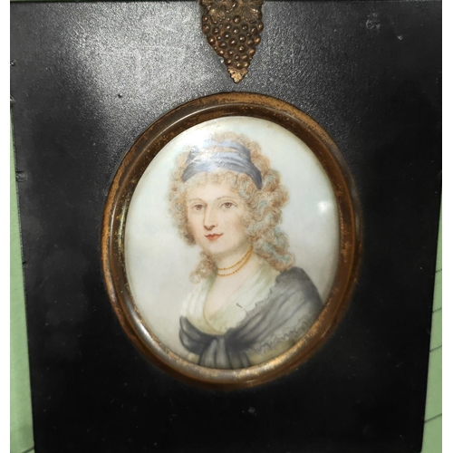 815 - A 19th century miniature portrait of a woman in dress with scarf, in ebonised frame with gilt mount ... 