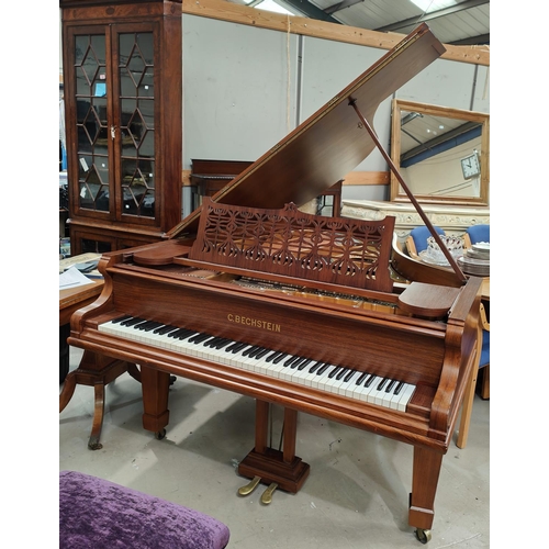 915A - A boudoir grand piano by C. Bechstein Berlin overstrung and iron framed on square tapering legs and ... 