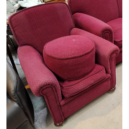 930 - A pair of Art Deco club arm chairs in burgundy coloured moquette upholstery with oak bun feet, a mat... 