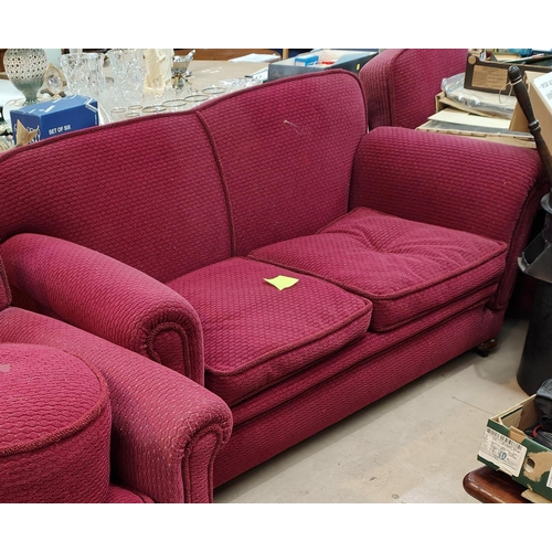 930 - A pair of Art Deco club arm chairs in burgundy coloured moquette upholstery with oak bun feet, a mat... 