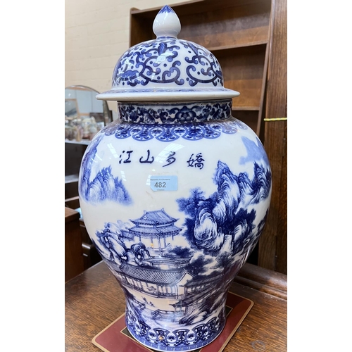 482 - A very large 20th century Chinese blue and white lidded inverted vase of baluster form, decorated wi... 