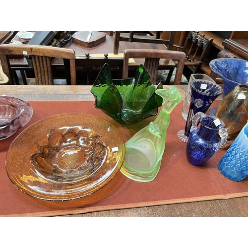 603 - A selection of coloured glass vases, table centres etc