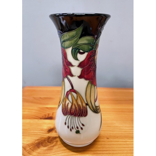 627 - A Moorcroft vase of waisted form, Anna Lily decoration, red dot to base, height 20.5cm