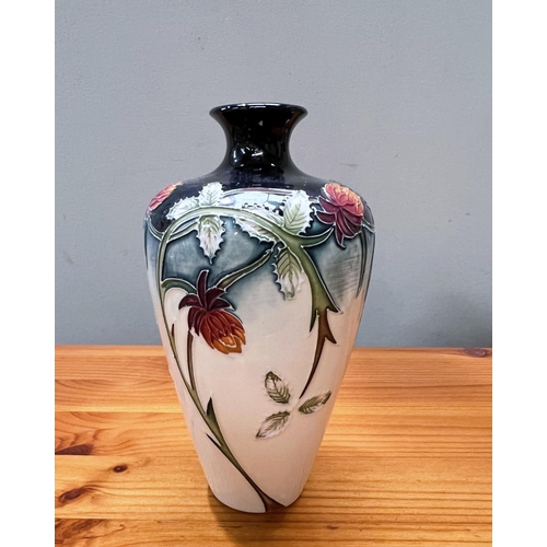 627C - A Moorcroft vase with floral decoration, initialled 'KW', dated, height 15cm