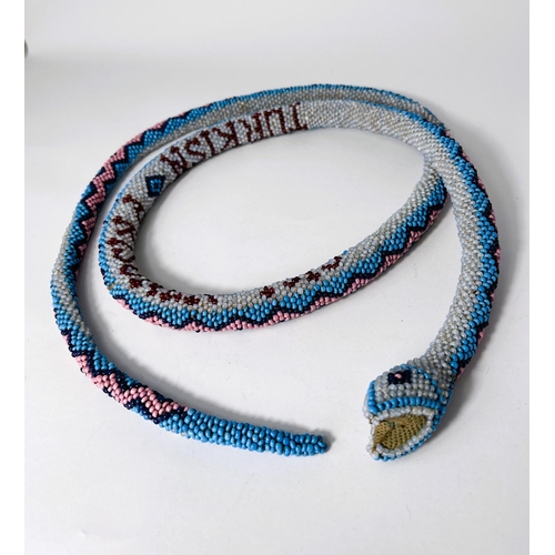 326 - WWI - a Turkish Prisoner of War beaded snaked dated 1919, 150cm