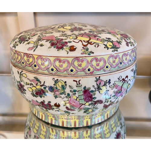 410 - A Chinese circular covered china box decorated in the 