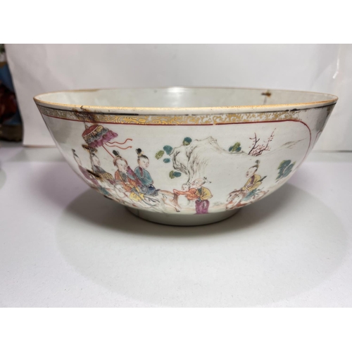 486A - A 18th century Chinese famille rose ceramic bowl with very fine decoration of groups meeting on hors... 