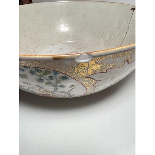 486A - A 18th century Chinese famille rose ceramic bowl with very fine decoration of groups meeting on hors... 