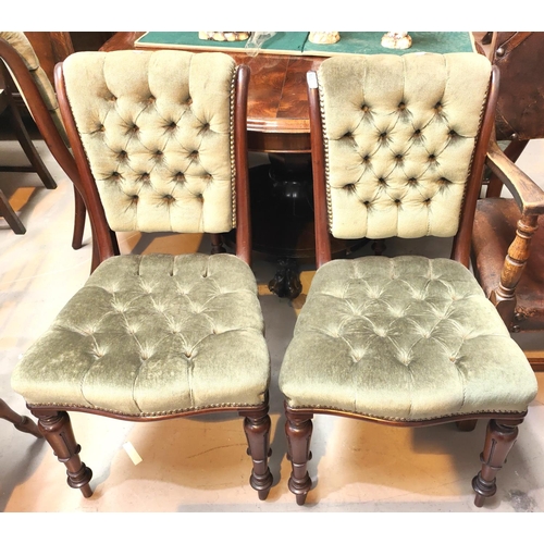 860 - A set of six early 19th century dining chairs with deeply button back green upholstery, carved taper... 