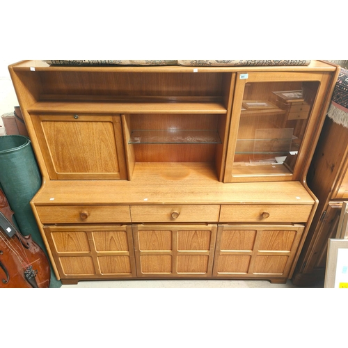 865 - A mid 20th century teak high back sideboard with 3 drawers and cupboards below, fall front cocktail ... 