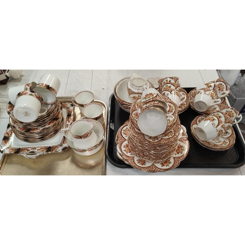 611 - A Sutherland china part tea service and an early 20th century autumn coloured floral part tea servic... 