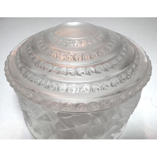 618 - A Lalique 'Enfants' lidded glass pot with relief decoration of children around, etched signature to ... 